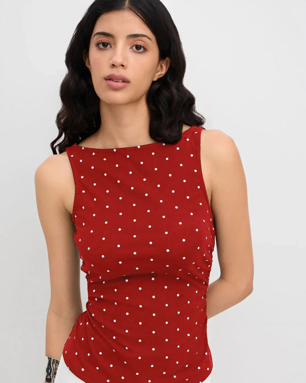 Boat Neck Slim Fit Peplum Hem Polka Dot Sleeveless Top