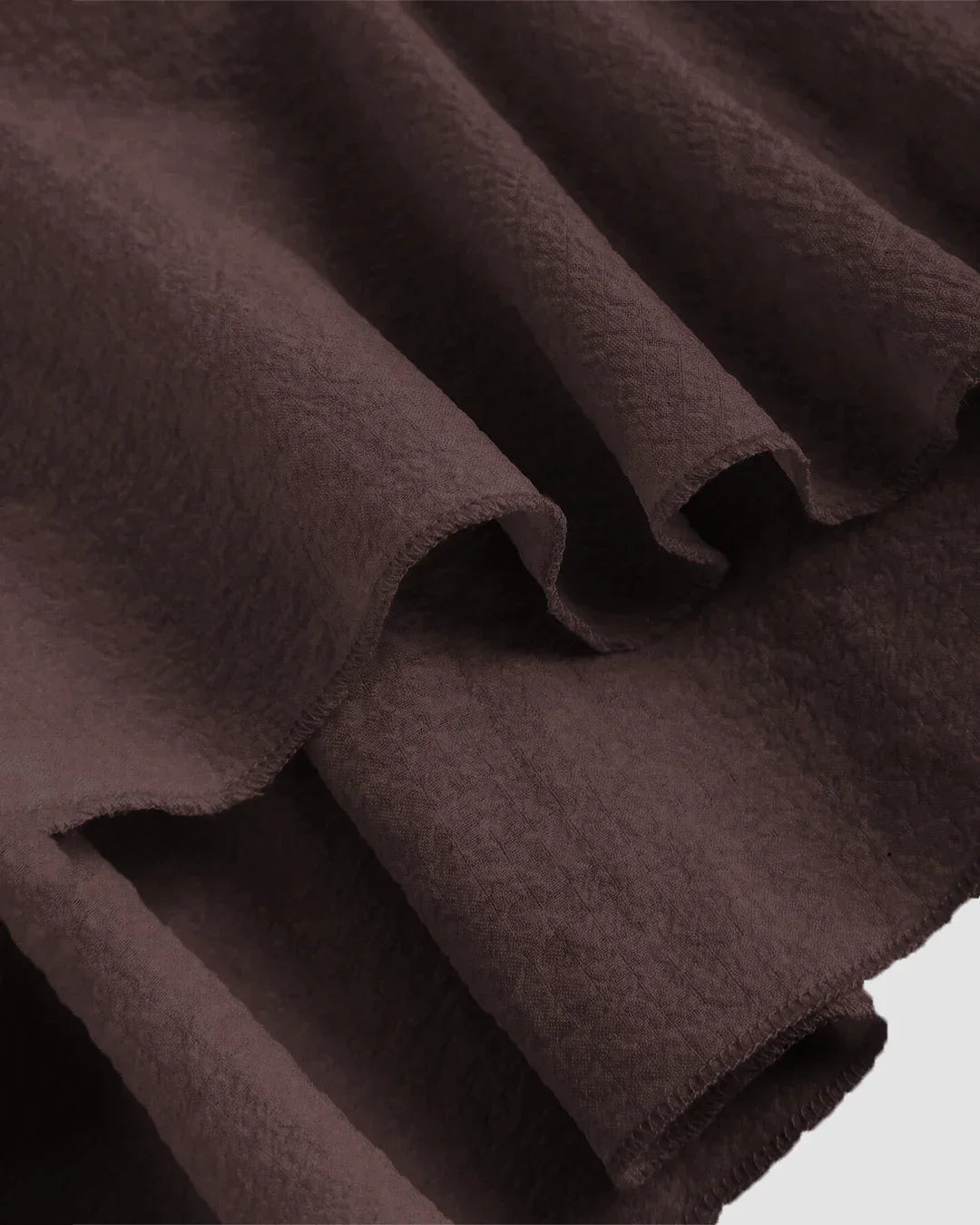 Ruffled Sleeve Tie Front Peplum Top in Brown