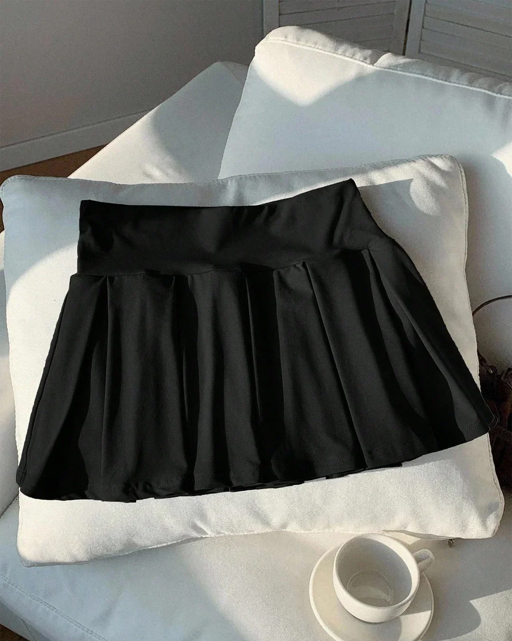 High-Waist Pleated Flared Mini Skirt in Black