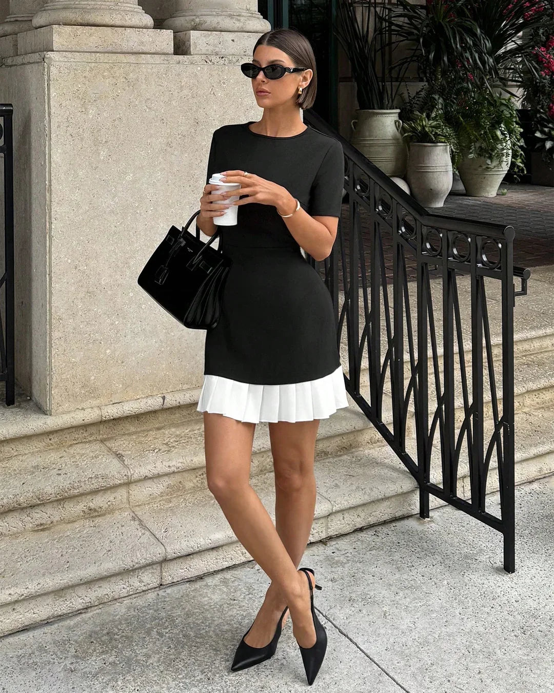 Black Mini Dress with White Pleated Hem