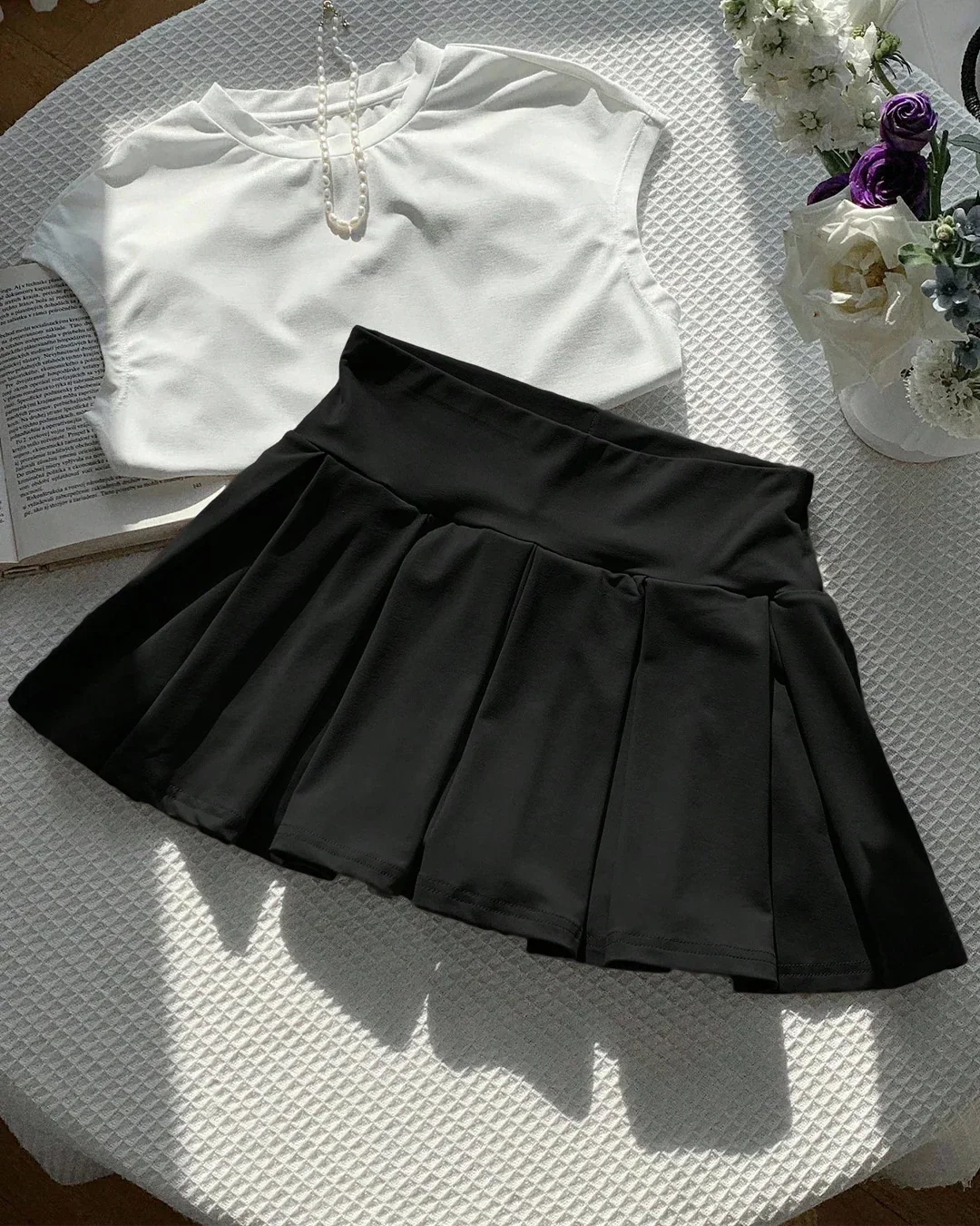 High-Waist Pleated Flared Mini Skirt in Black