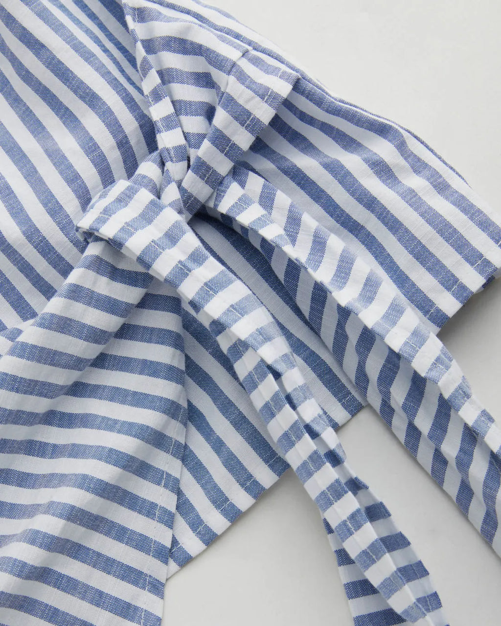 Collared V Neck Wrap Style Short Sleeve Shirt in Blue