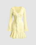 Ruffled V Neck Tie Up Long Sleeve Mini Dress in French Vanilla