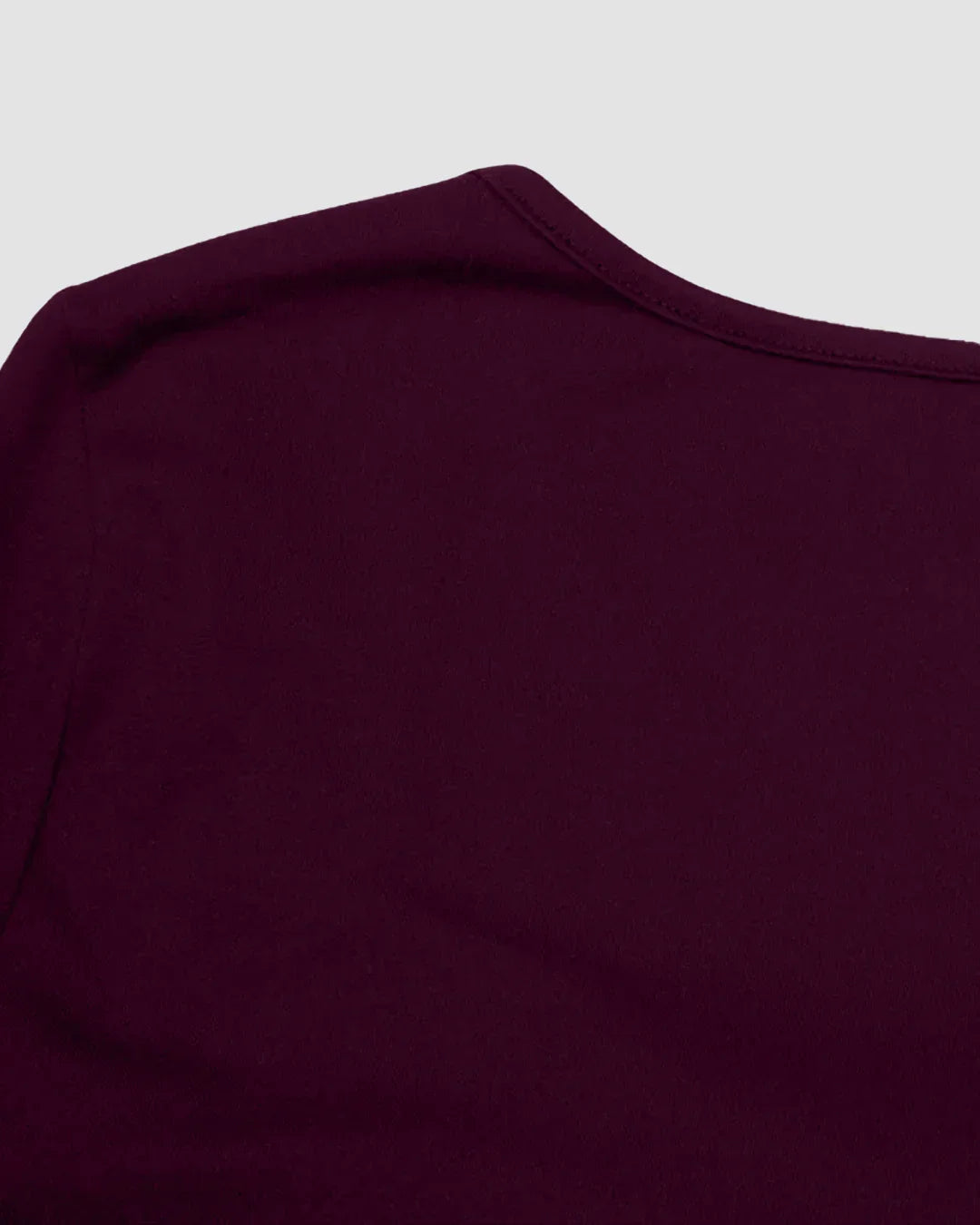 Party Ribbed Twist Front Long Sleeve Top in Maroon