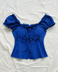 Puff Sleeve Off Shoulder Tie Front Peplum Top in Blue