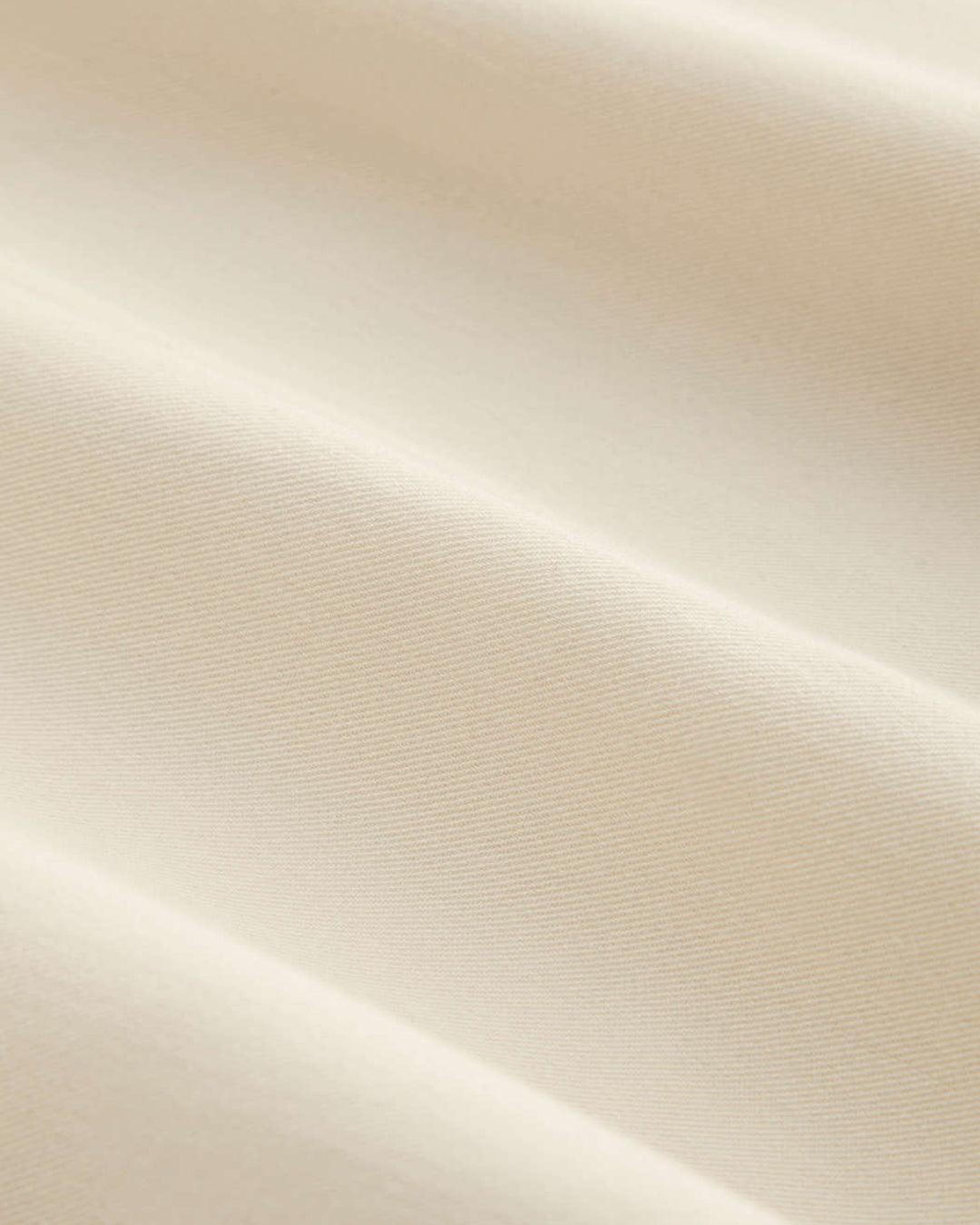 Round Neck Button Front Sleeveless Top in Beige