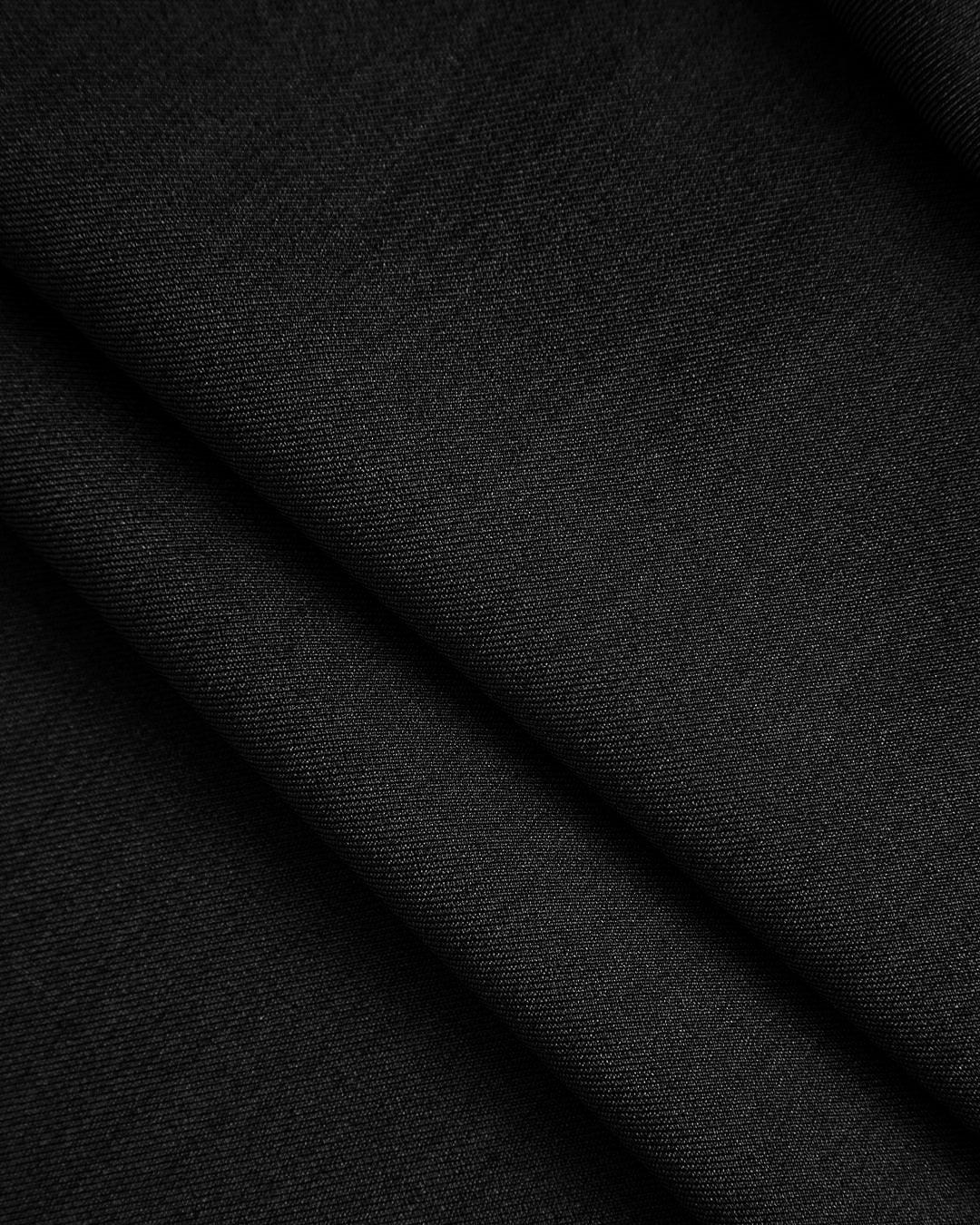 Solid Knot Asymmetrical Trousers In Black