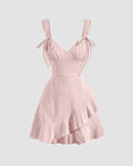 V Neck Tie Strap Ruffle Hem Mini Dress in Powder Pink