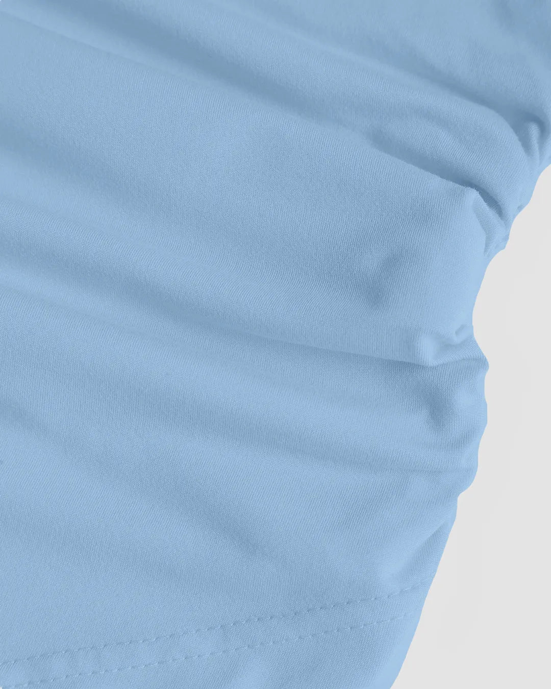 Boat Neck Bow-Shoulder Asymmetric Hem Full Sleeve Top in Blue