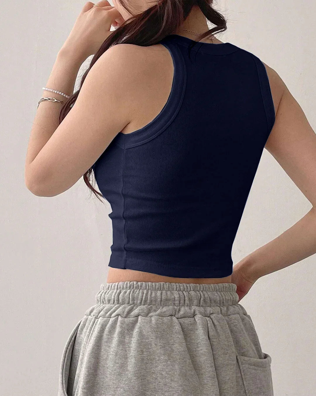 Sleeveless Ribbed High Neck Crop Top in Navy Blue